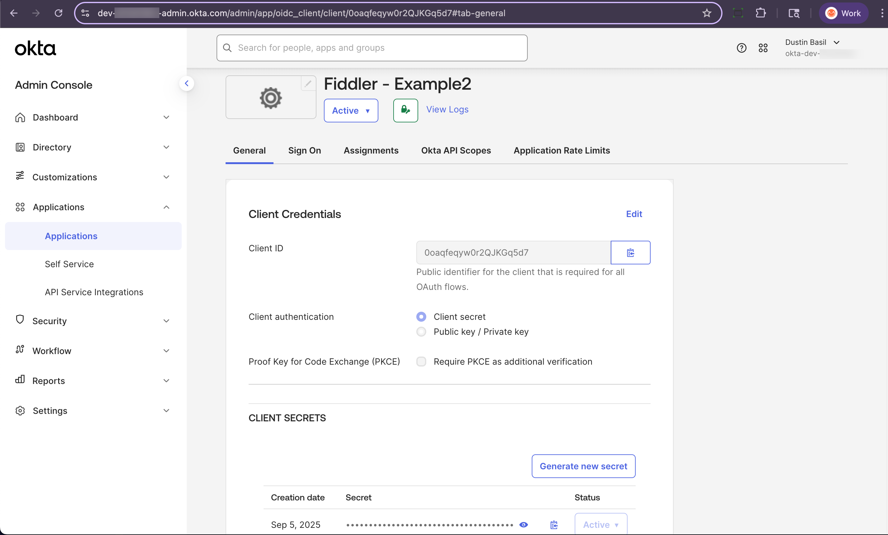 Okta admin console application page with client id and secret